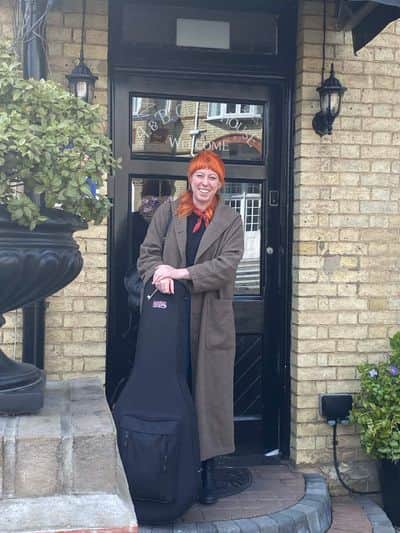 Guest musician performing at the guesthouse